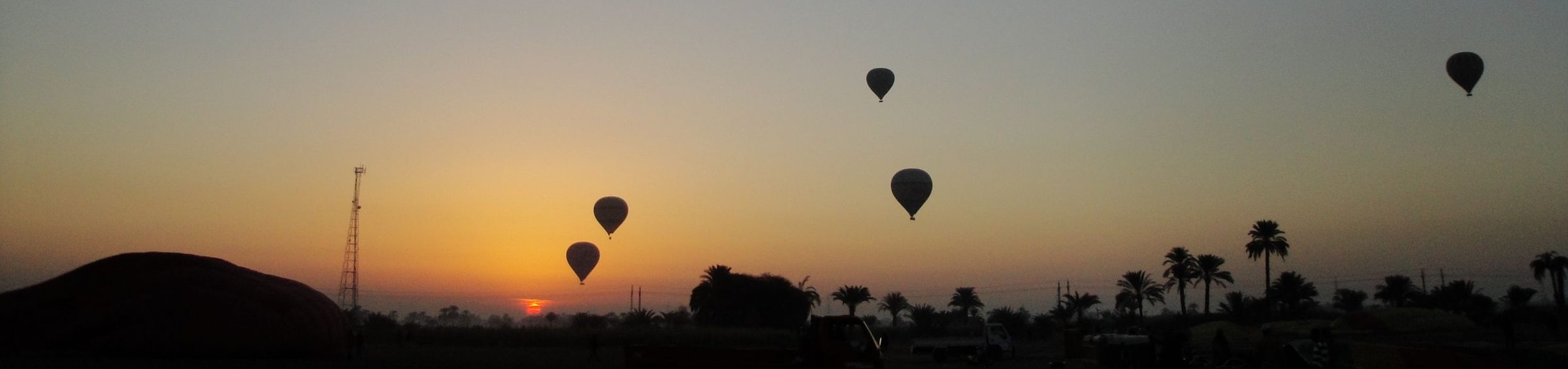 Hot-air balloons at sunrise over the Nile valley, Egypt